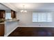 Hardwood floors and chandelier in dining room at 3166 Cloverhurst Dr, Atlanta, GA 30344