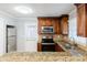 Kitchen with granite countertops and stainless steel appliances at 3166 Cloverhurst Dr, Atlanta, GA 30344