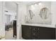 Bathroom with double vanity, marble countertop, and access to bedroom at 1193 Colony Dr, Marietta, GA 30068