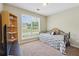 Cozy bedroom with a daybed and a built-in shelf at 41 Nina Ct, Jonesboro, GA 30238