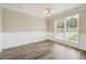 Bright dining room with hardwood floors and a view to the backyard at 41 Nina Ct, Jonesboro, GA 30238