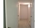 Clean, unfinished basement with light colored walls and flooring at 11350 Cranwood Cv, Roswell, GA 30075