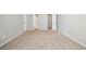 Bright bedroom featuring neutral walls and carpet flooring at 1102 Forest East Dr, Stone Mountain, GA 30088