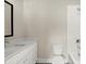 Clean bathroom with white vanity, toilet and shower/tub combo at 2329 Mason Dr # D24, Atlanta, GA 30316