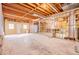 Unfinished basement with garage access and workshop area at 5923 Liberty Rd, Winston, GA 30187