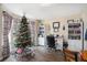 Bright home office with built-in shelving, a desk, and a large window at 9985 Rivercliff Ln, Villa Rica, GA 30180