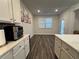 Kitchen features a breakfast nook and back door access at 3330 Deaton Trl, Buford, GA 30519