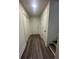 Bright hallway leading to basement rooms and stairs at 360 Chestnut Dr, Covington, GA 30016