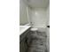 Clean bathroom with a tub, toilet and vanity at 360 Chestnut Dr, Covington, GA 30016