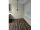 Breakfast nook with light walls and laminate floor at 360 Chestnut Dr, Covington, GA 30016