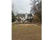 Two-story house with a deck and large backyard at 360 Chestnut Dr, Covington, GA 30016