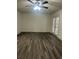 Spacious living room with hardwood floors and access to outdoors at 360 Chestnut Dr, Covington, GA 30016