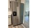Stainless steel refrigerator with ice and water dispenser at 360 Chestnut Dr, Covington, GA 30016