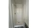 Clean white shower stall with tiled floor at 360 Chestnut Dr, Covington, GA 30016