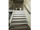 Interior grey and white staircase at 360 Chestnut Dr, Covington, GA 30016