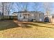 House backyard with grassy area and wooden fence at 2452 Semmes St, Atlanta, GA 30344