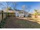 House backyard with grassy area and wooden fence at 2452 Semmes St, Atlanta, GA 30344