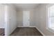 Small office or den with white brick wall and carpet at 2452 Semmes St, Atlanta, GA 30344