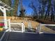 View from deck to backyard, showcasing a stone path and fire pit at 501 Virginia Se Pl, Marietta, GA 30067