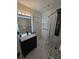 Elegant bathroom with modern vanity and frameless glass shower at 501 Virginia Se Pl, Marietta, GA 30067