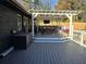 Spacious deck with pergola, outdoor seating, and built-in bar at 501 Virginia Se Pl, Marietta, GA 30067