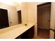 Bathroom with a vanity, mirror, and access to other rooms at 8178 Lochley Dr, Fairburn, GA 30213