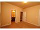 Spacious bedroom with neutral walls and carpet at 8178 Lochley Dr, Fairburn, GA 30213