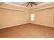 Large bedroom with high ceilings and ceiling fan at 8178 Lochley Dr, Fairburn, GA 30213