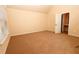 Spacious bedroom with an ensuite bathroom and carpet flooring at 8178 Lochley Dr, Fairburn, GA 30213