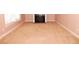 Living room with neutral carpeting and fireplace at 8178 Lochley Dr, Fairburn, GA 30213