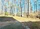 Large backyard with playset and storage shed at 3945 Peninsula Ct, Lawrenceville, GA 30044
