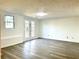 Finished basement with gray vinyl flooring and French doors at 3945 Peninsula Ct, Lawrenceville, GA 30044