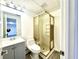 Basement bathroom with shower, toilet and vanity at 3945 Peninsula Ct, Lawrenceville, GA 30044