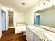 Main bathroom with double vanity and soaking tub at 3945 Peninsula Ct, Lawrenceville, GA 30044