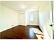 Spacious bedroom with hardwood floors and large closet at 3945 Peninsula Ct, Lawrenceville, GA 30044