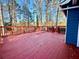 Red stained deck provides ample outdoor space at 3945 Peninsula Ct, Lawrenceville, GA 30044