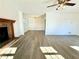 Dining room with hardwood floors and view into living room at 3945 Peninsula Ct, Lawrenceville, GA 30044