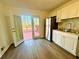 Bright kitchen with stainless steel appliances and deck access at 3945 Peninsula Ct, Lawrenceville, GA 30044