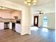 White kitchen cabinets, granite counters, and stainless steel appliances at 3945 Peninsula Ct, Lawrenceville, GA 30044