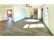 Open living area with hardwood floors and access to deck at 3945 Peninsula Ct, Lawrenceville, GA 30044
