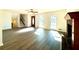 Bright living room featuring hardwood floors and fireplace at 3945 Peninsula Ct, Lawrenceville, GA 30044