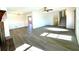 Living room with hardwood floors, high ceilings, and natural light at 3945 Peninsula Ct, Lawrenceville, GA 30044