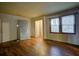 Living room with hardwood floors and a window at 1347 Westmont Sw Rd, Atlanta, GA 30311