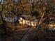 Aerial view showing the house's setting amongst trees at 1743 Marcel Sw Ave, Atlanta, GA 30311