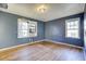 A bedroom with hardwood floors and window at 1743 Marcel Sw Ave, Atlanta, GA 30311