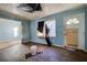 Living room with hardwood floors needing renovation at 1743 Marcel Sw Ave, Atlanta, GA 30311