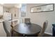 Round dining table with four chairs, in open concept space at 2418 Brookdale Ne Dr, Atlanta, GA 30345