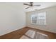 Bright bedroom with hardwood floors and a ceiling fan at 3039 Sable Run Rd, Atlanta, GA 30349