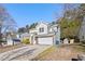 Two-story house with attached garage and driveway at 3039 Sable Run Rd, Atlanta, GA 30349