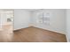 Spacious living room featuring hardwood floors and natural light at 3039 Sable Run Rd, Atlanta, GA 30349